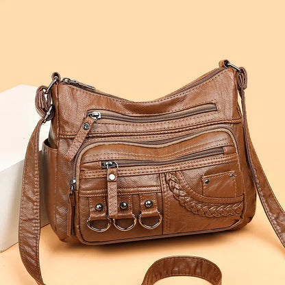 Claudia® | Borsa morbida con zip dal fascino vintage